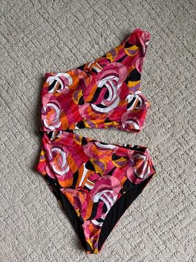 Beach Riot Black Labeled Swimwear with Pink and Orange Accent Trim